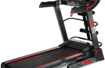 Tapis de course Fitfiu MC-500 doté d’un écran LCD, d’une inclinaison motorisée et de plusieurs accessoires inclus, comme des haltères, un support pour abdominaux et une station de massage. Conception robuste avec un design noir et rouge.